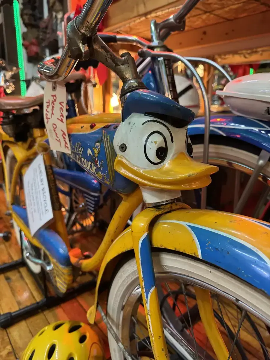 Donald duck themed bike with head badge